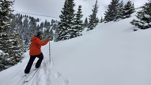 Skier on the slopes of A-Basin in new ski gear